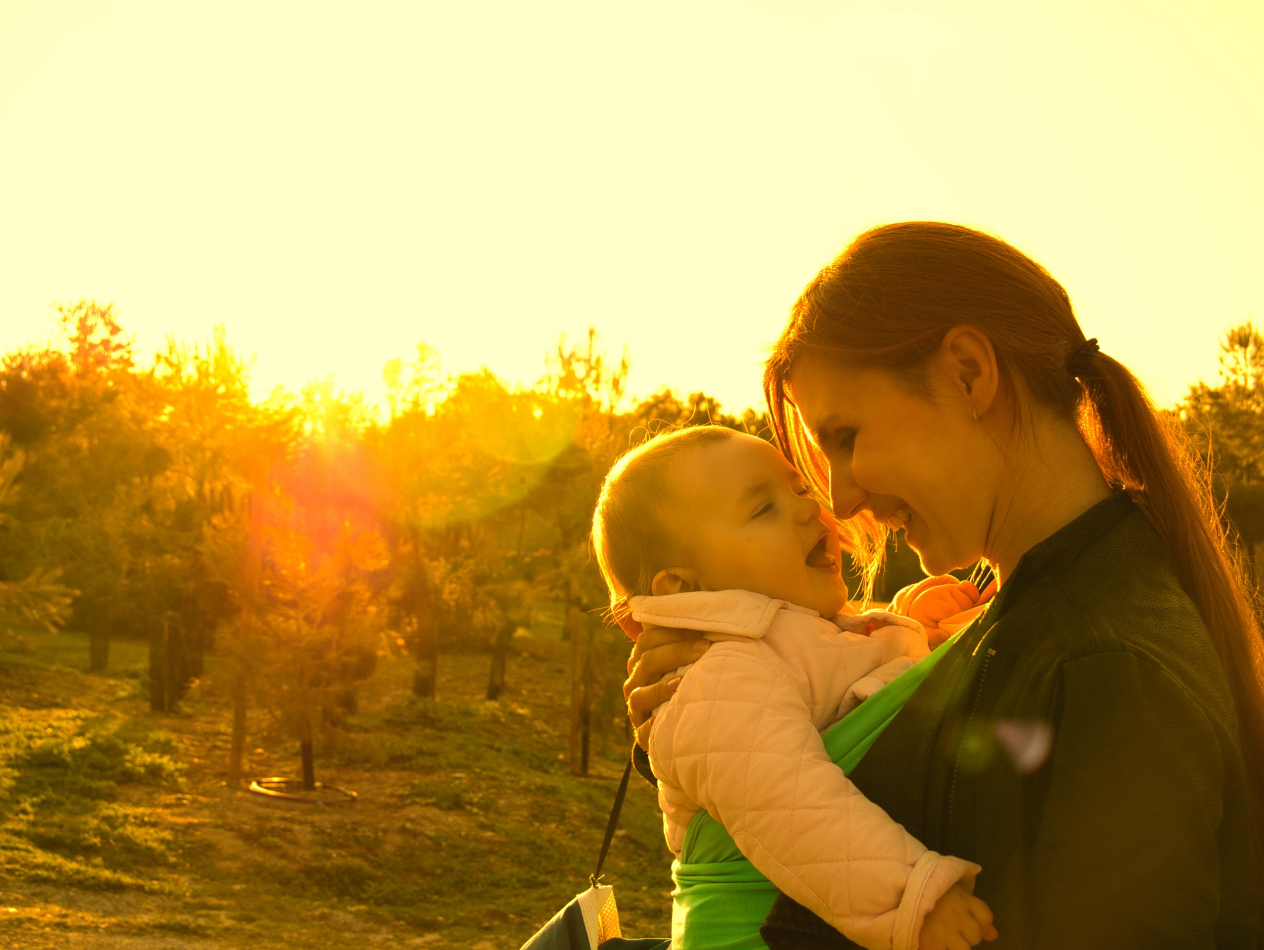 A,Mother,Shows,Affection,To,Her,Baby,Girl,While,Carrying
