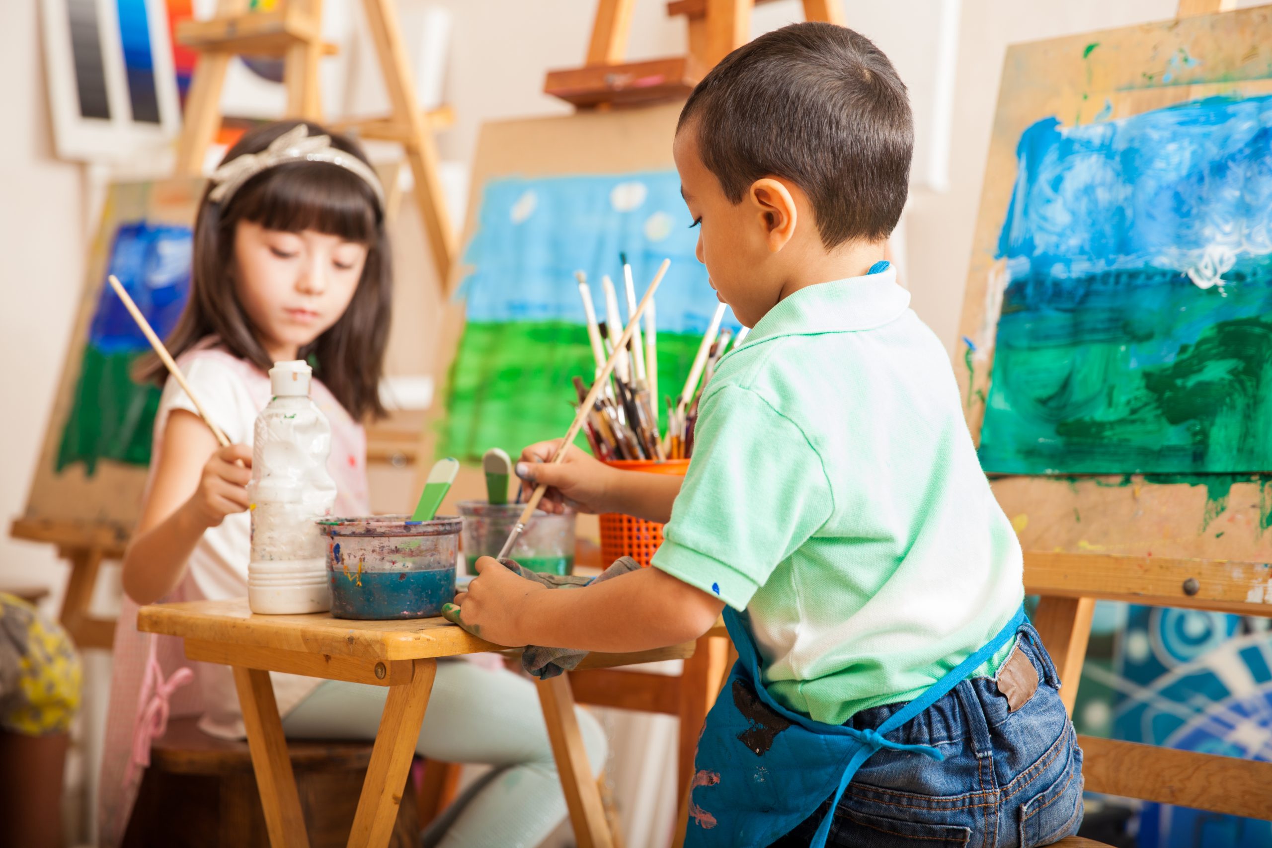 Group,Of,Kids,Working,On,A,Painting,Of,A,Landscape
