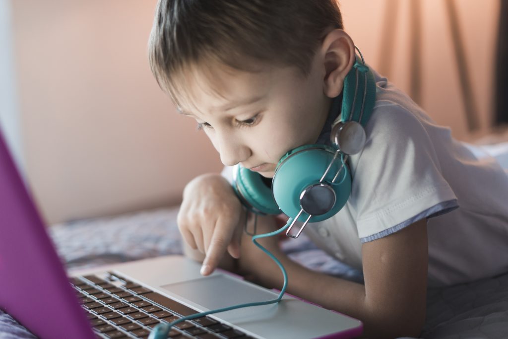 boy-using-laptop Generation Alpha