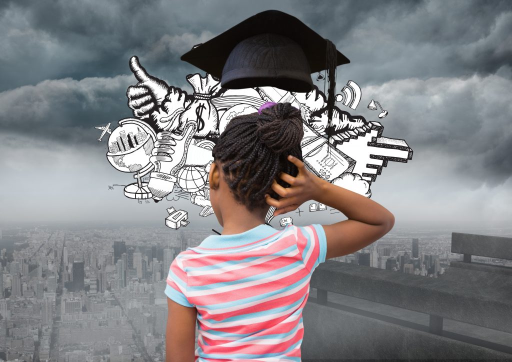 Thoughtful girl with graduation cap against cityscape in background ครูควรประเมินความคิดสร้างสรรค์อย่างไร